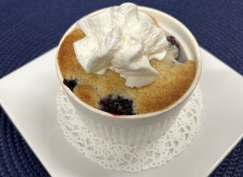 Blueberry cobbler in white ramekin