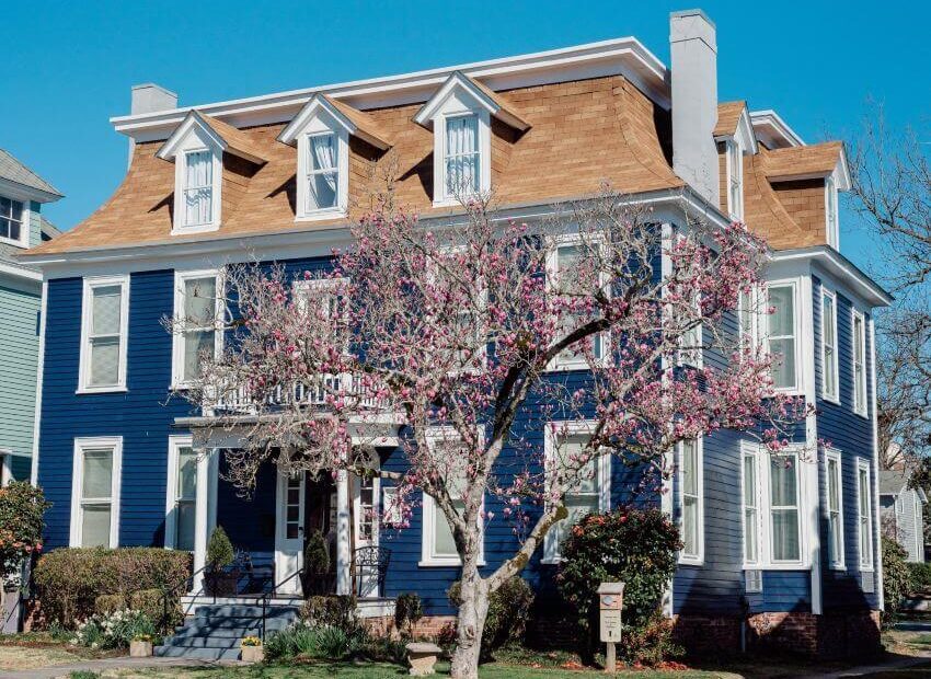 Exterior view of 3 story old blue house