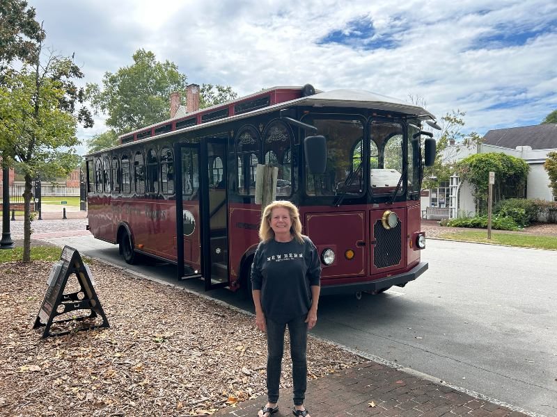 Old-fashioned red trolley with black roof