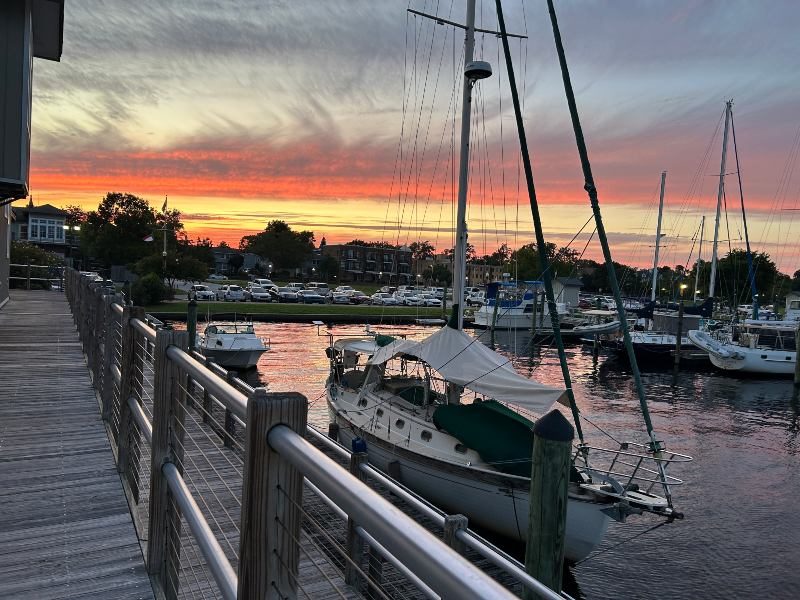 Sunset view of river and docked boats